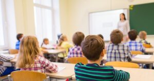 education, elementary school, learning and people concept - grou